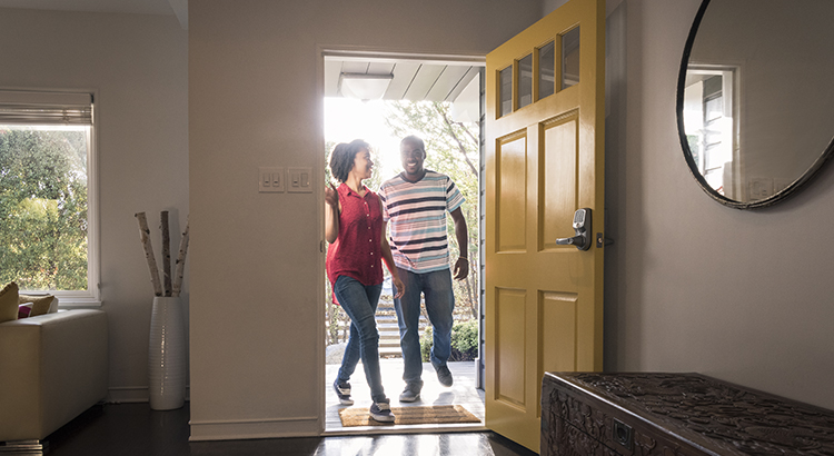 Couple at the front door of their home before the Monmouth County tax appeal deadline